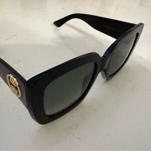 Gucci Black Sunglasses with Gold Emblem